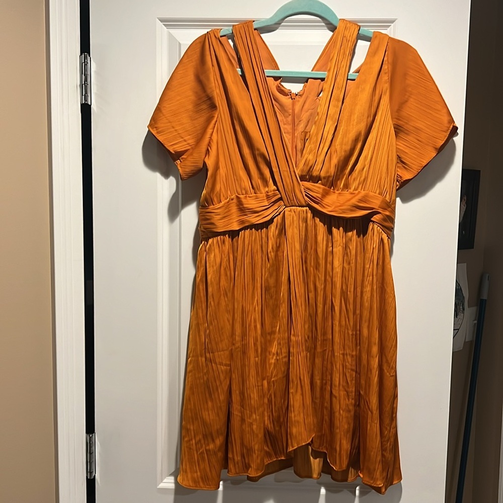 NEW! Anthropologie dress. Beautiful shade of orange, with fun strap detail. NWOT